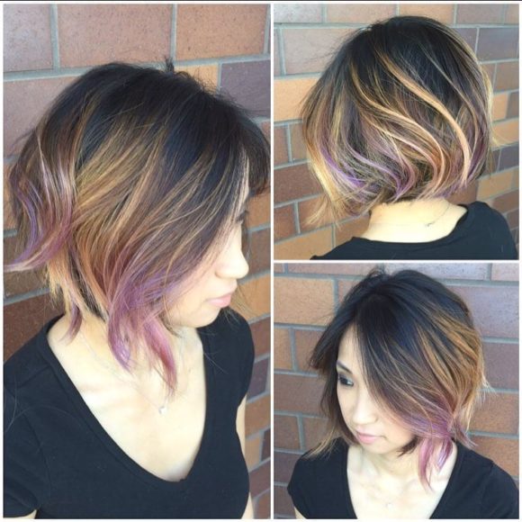 Slightly Angled Blowout Bob on Dark Hair with Caramel and Rose Highlights Medium Length Hairstyle