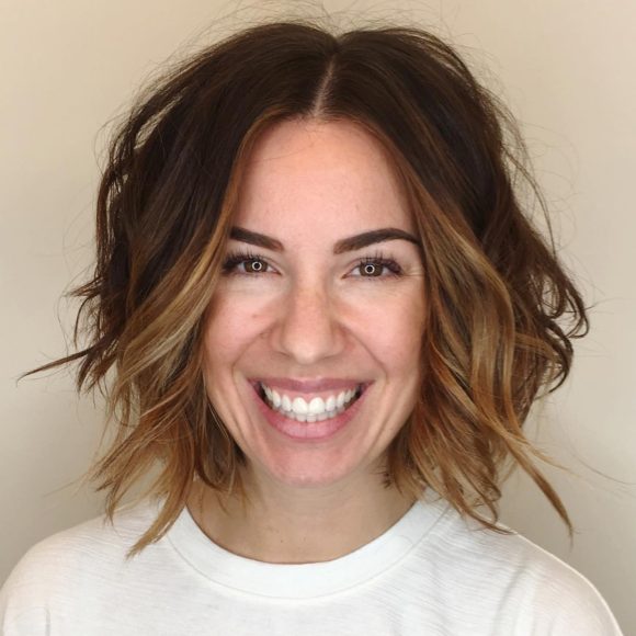 Slightly Angled Soft Layer Bob with Undone Wavy Texture and Face Framing Brunette Balayage Short Hairstyle