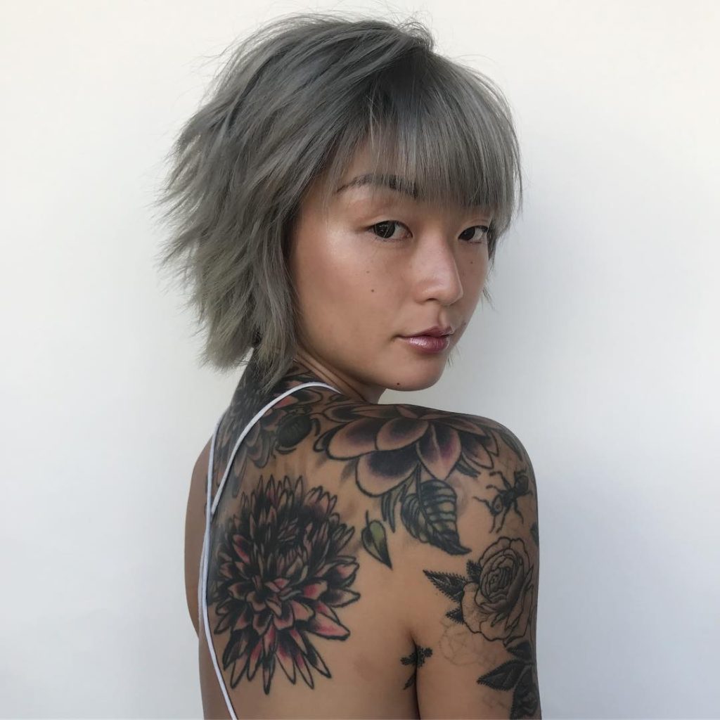 Smoky Grey Choppy Pixie Bob with Messy Texture and Brow Skimming Bangs Short Fall Hairstyle