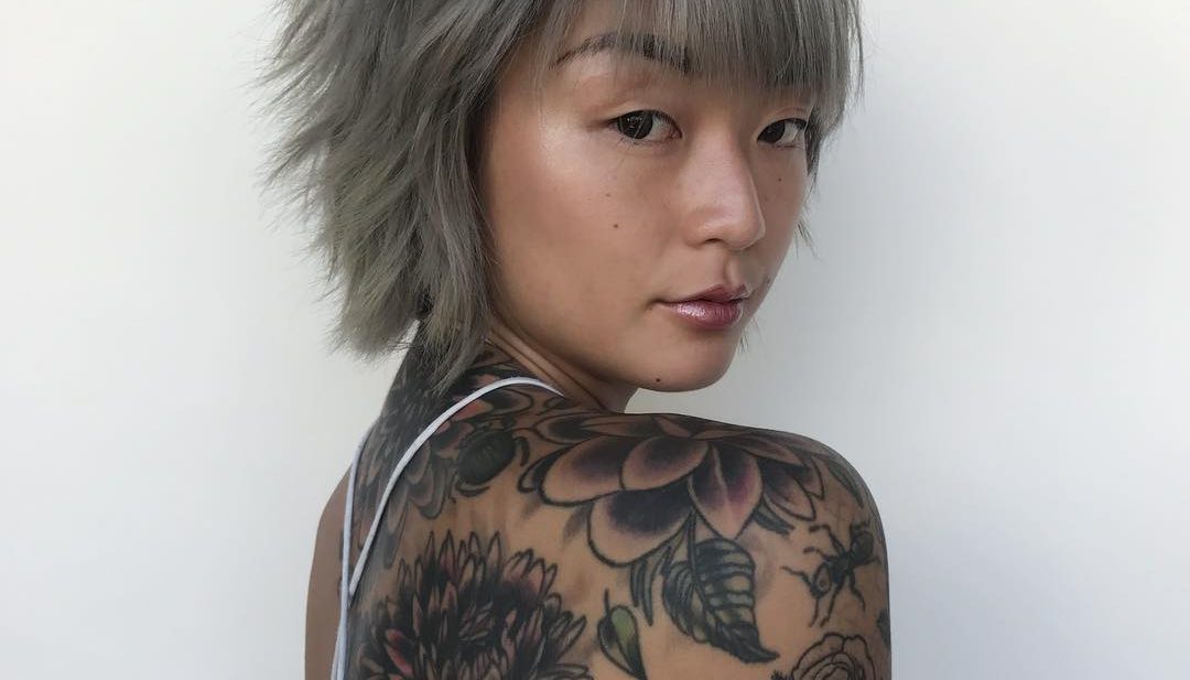 Smoky Grey Choppy Pixie Bob with Messy Texture and Brow Skimming Bangs Short Fall Hairstyle