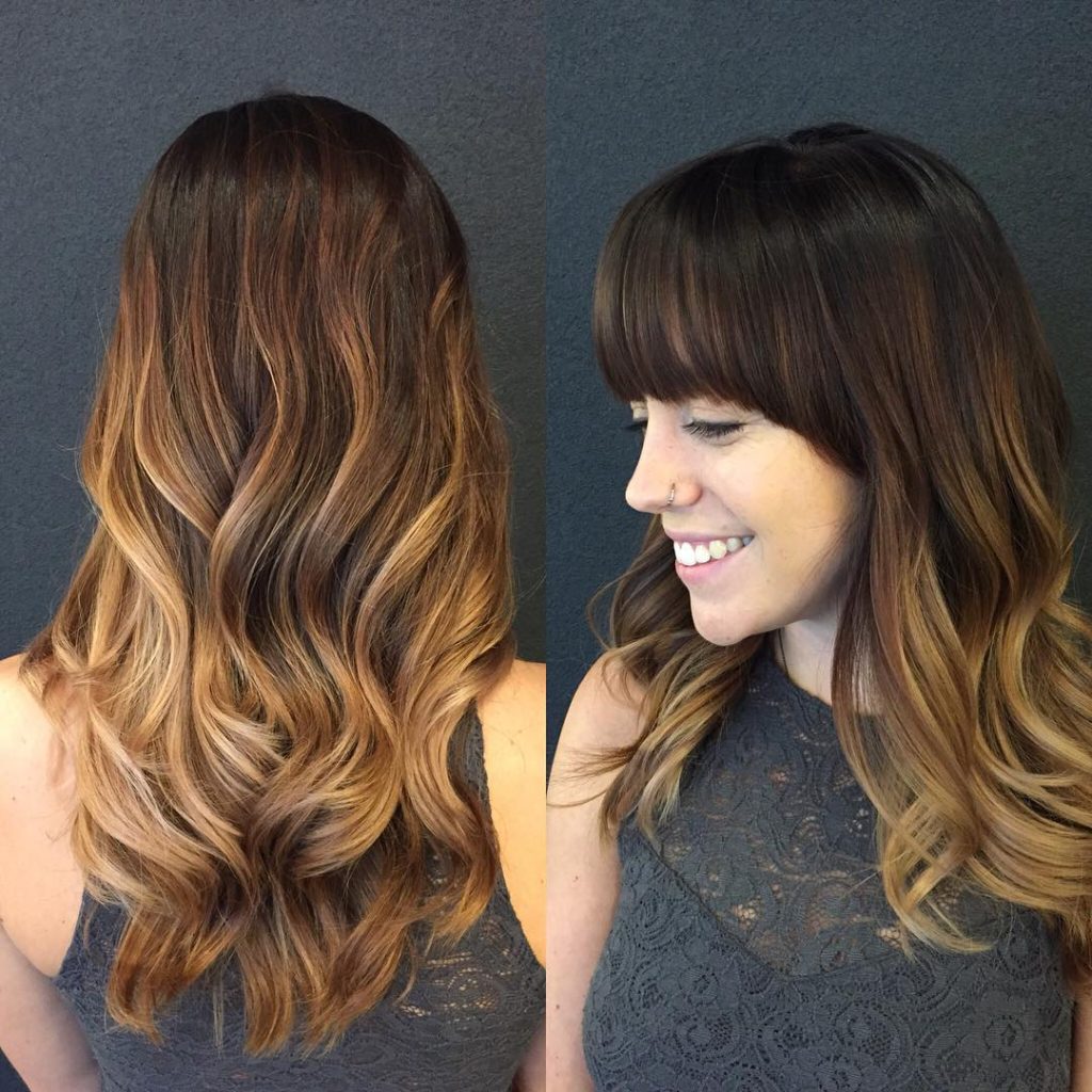 Soft Wavy Layered Cut with Brunette Color Melt Balayage and Full Brow Skimming Bangs Long Hairstyle