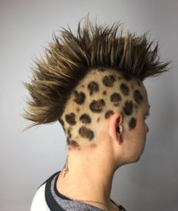 Spiked Messy Textured Mohawk with Hand Painted Brown Color and Leopard Spots Side Art Eccentric Punk Halloween Hairstyle