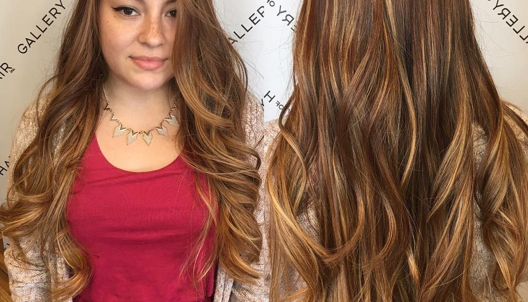 Super Long Wavy Layered Cut with Warm Bronde Balayage Color Long Hairstyle
