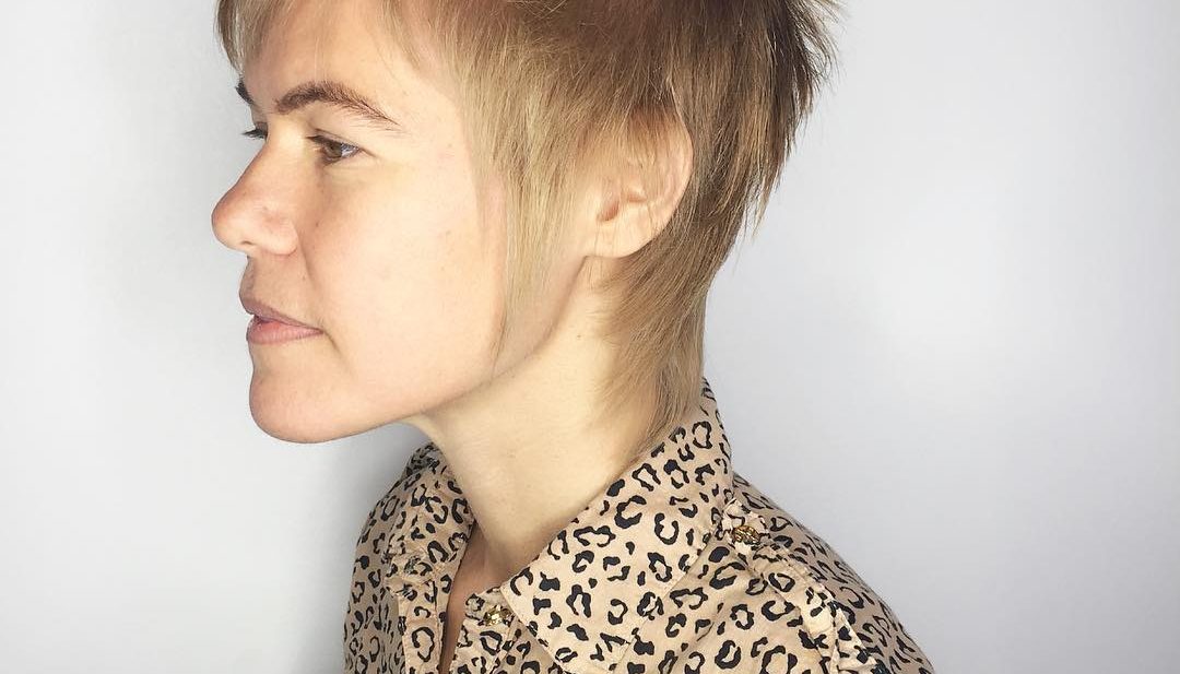 Modern Shaggy Mullet with Blonde Color and Choppy Bangs Short Hairstyle
