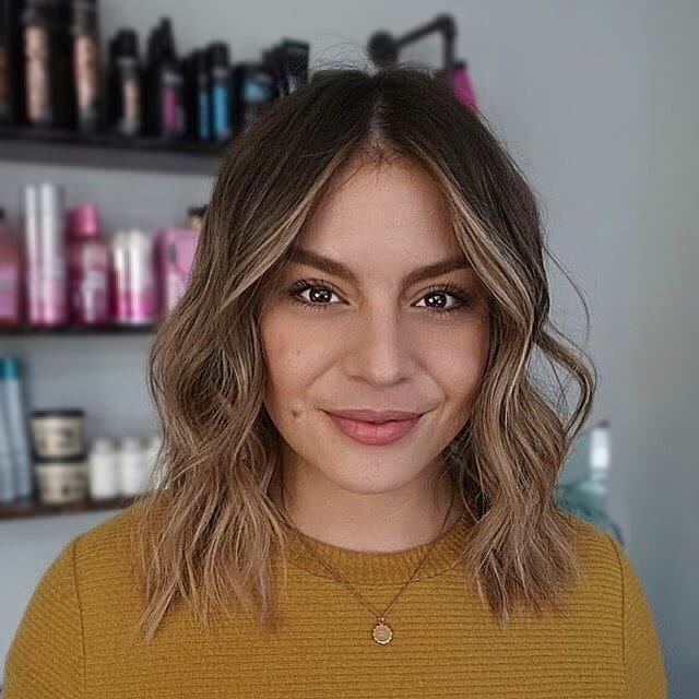 Undone Wavy Textured Bob with Blonde Balayage and Center Part Medium Length Hairstyle