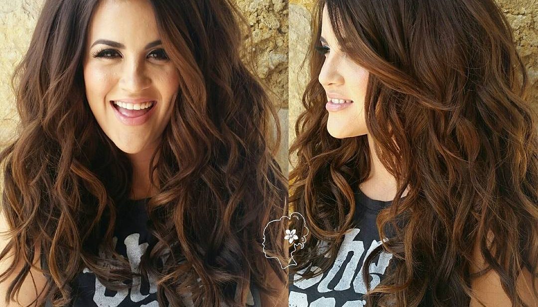 Voluminous Layered Cut with Allover Waves and Subtle Brunette Ombre Color Long Hairstyle