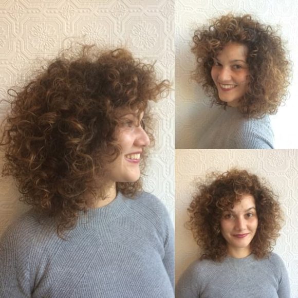 Voluminous Tousled Curly Bob with Curly Side Swept Bangs and Sun Kissed Caramel Ombre