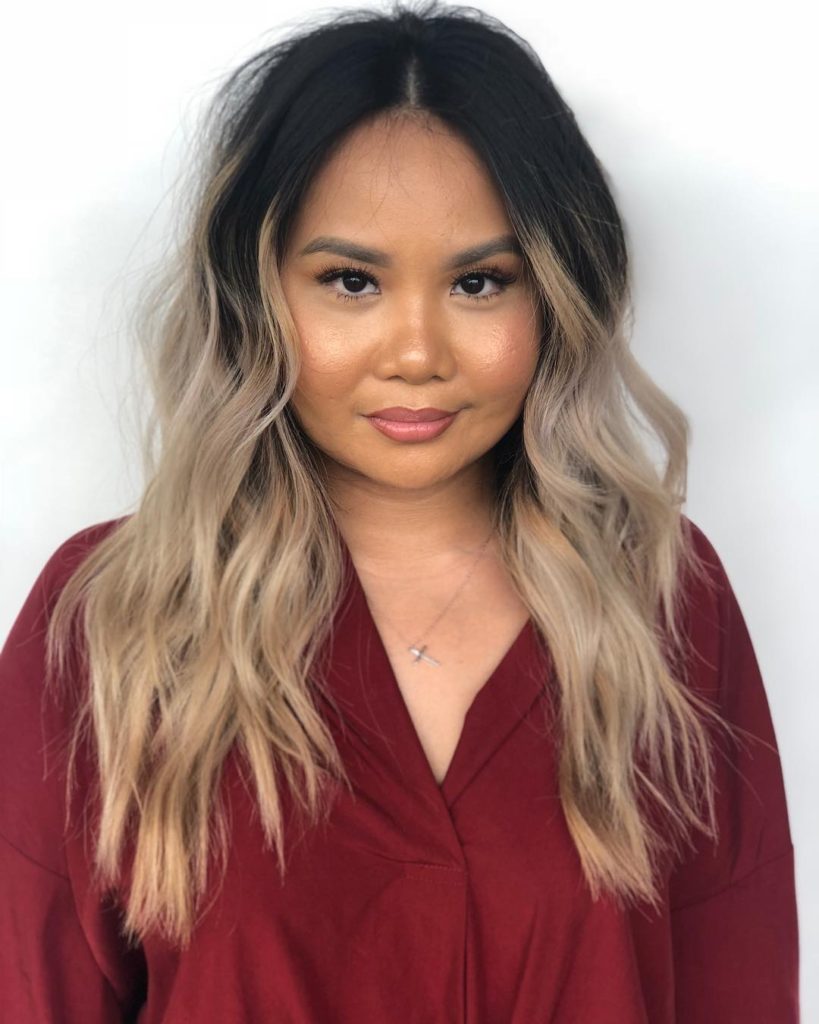 Wavy Long Layered Cut with Curtained Face Framing Layers and Dramatic Black to Blonde Ombre Hair Color Long Fall Hairstyle