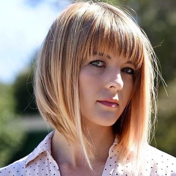 Long A Line Bob with Brow Skimming Fringe Bangs with Blonde Highlights