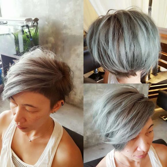 Textured Side Swept Undercut Pixie with Fringe and Silver Color