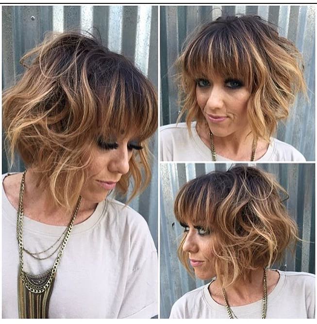 Short Messy Bob with Bangs and Wavy Texture on Brunette Balayage