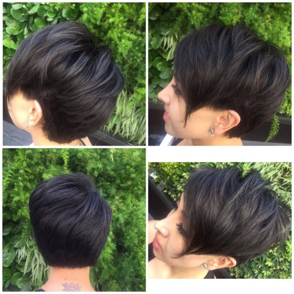 Short Voluminous Textured Pixie with Side Swept Face Framing Layers on Dark Hair