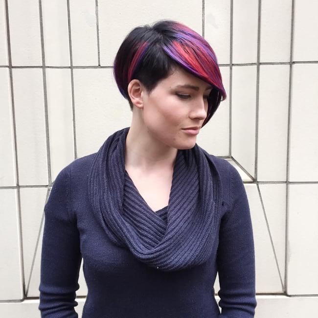 Asymmetrical Pixie with Side Swept Bangs and Pink and Purple Highlights